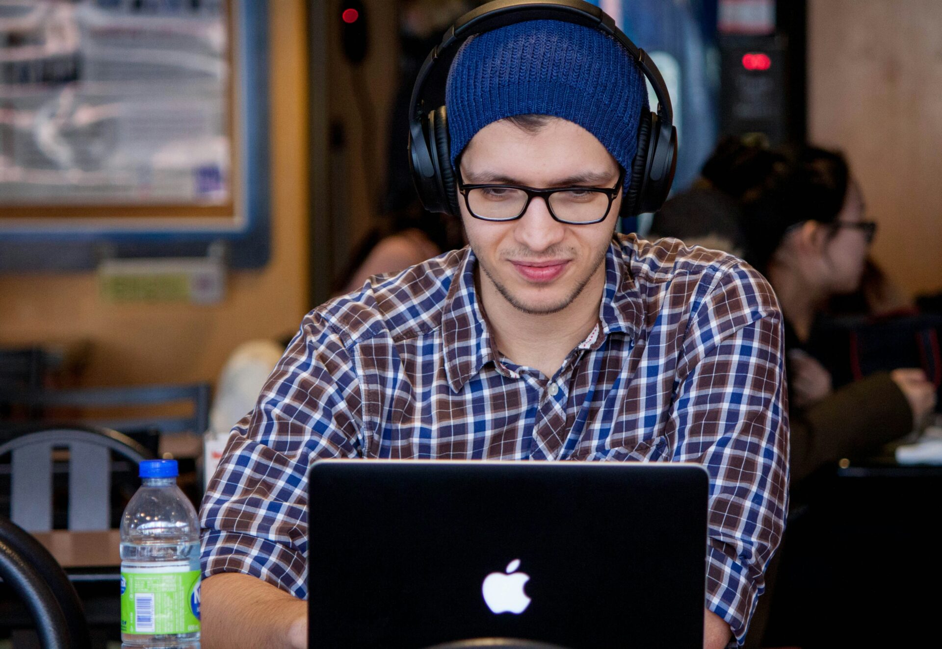 Student with headphones listening
